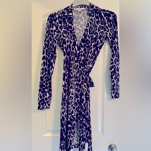 XS wrap dress. Purple and black leopard print. Never worn